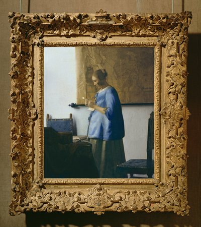 Woman Reading a Letter by Jan Vermeer van Delft